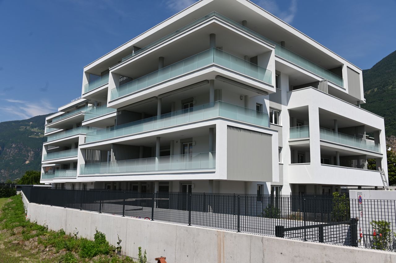 Apartment building with external insulation and balconies